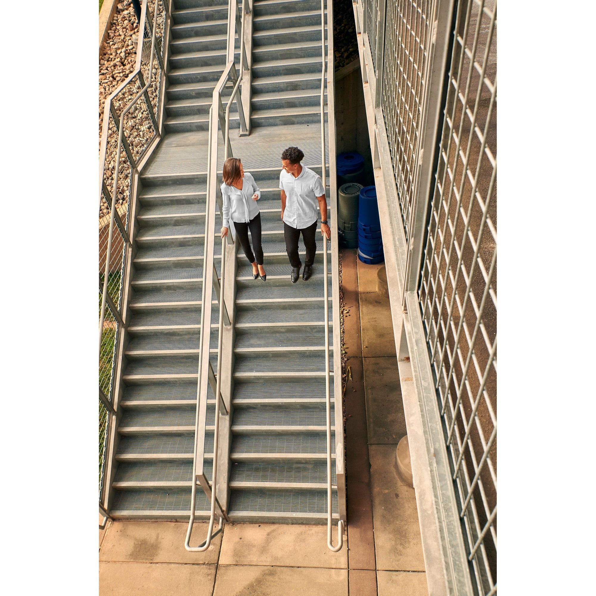 Manufacturer lifestyle view walking on stairs