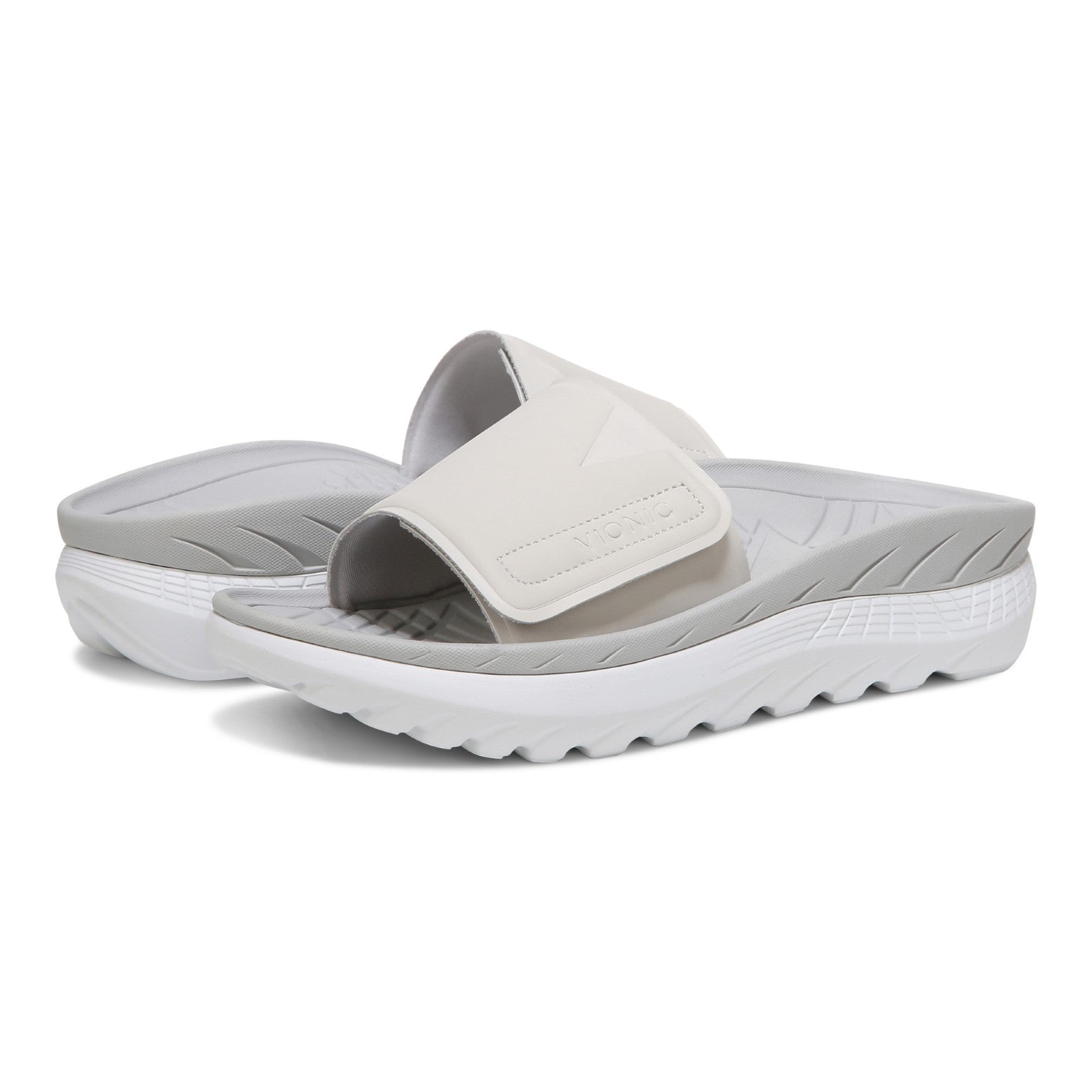 Vionic Rejuvenate Unisex Slide Recovery Sandals - White/vapor - pair left angle