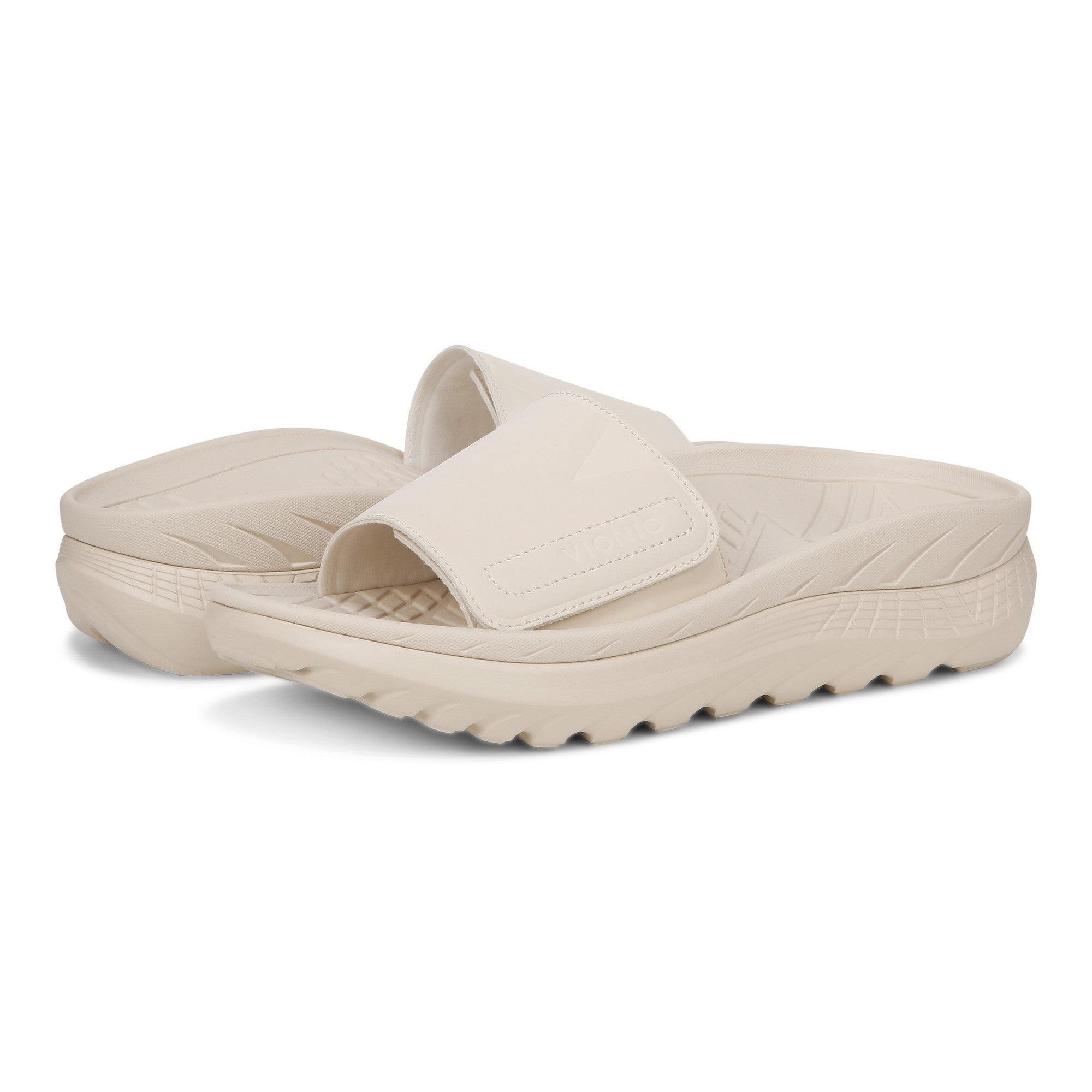 Vionic Rejuvenate Unisex Slide Recovery Sandals - Cream - pair left angle