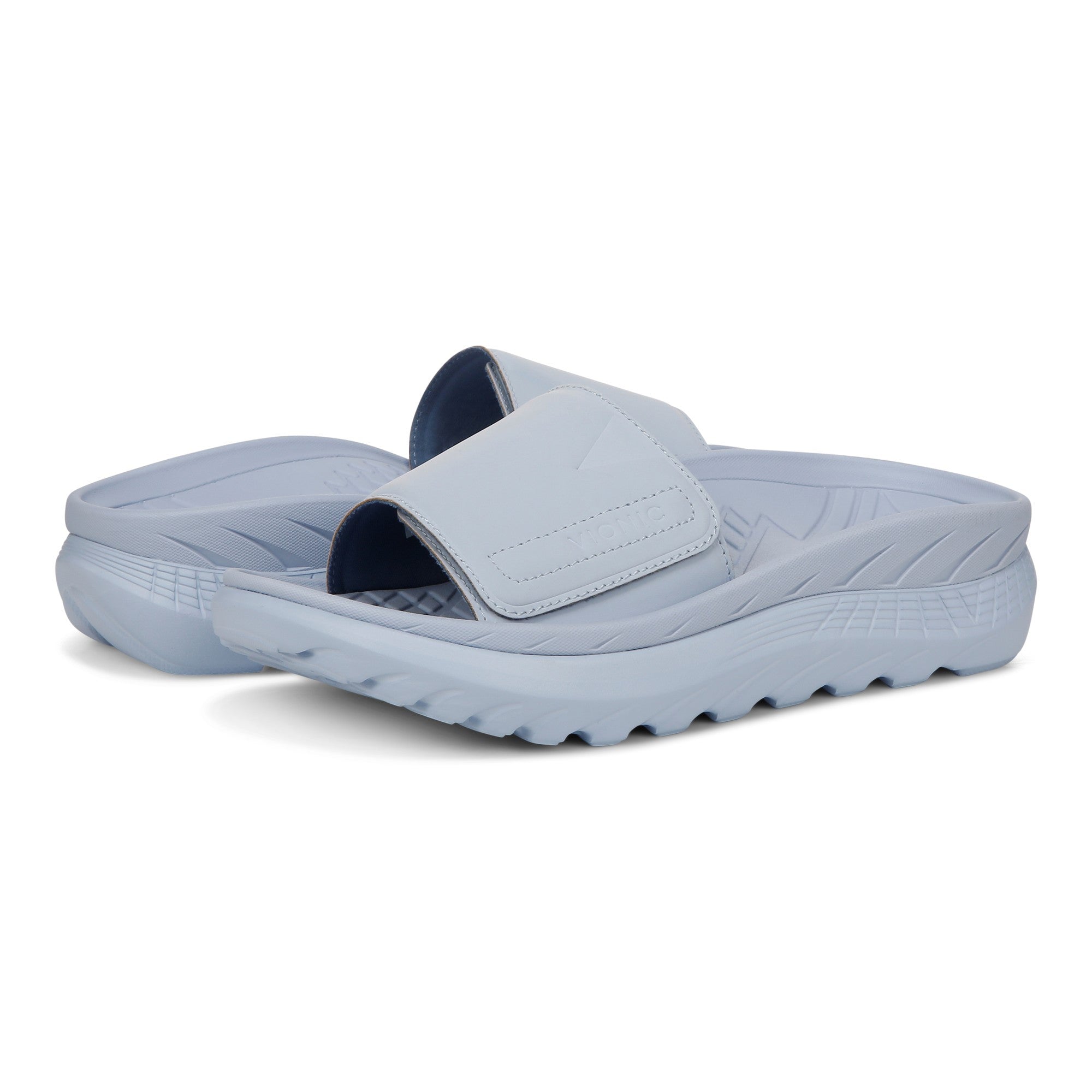 Vionic Rejuvenate Unisex Slide Recovery Sandals - Skyway Blue - pair left angle