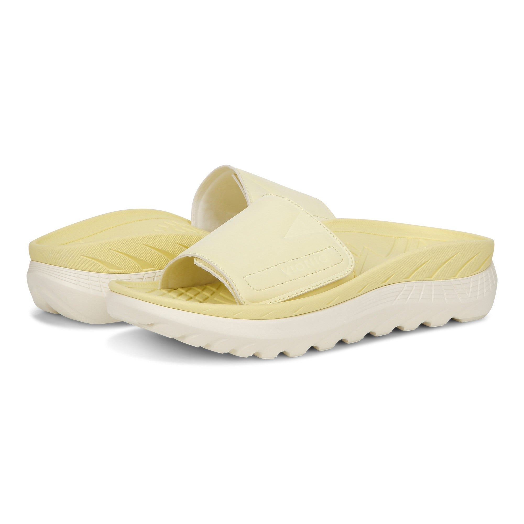 Vionic Rejuvenate Unisex Slide Recovery Sandals - Yellow Pear - pair left angle